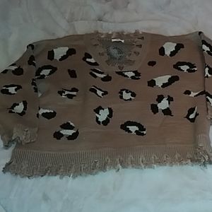 1x sweater. Nice and warm. Soft on the inside.